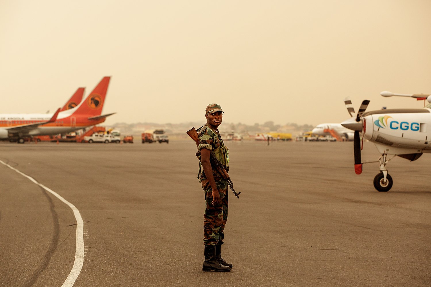  Militar man at 4 Fevereiro Airport. 